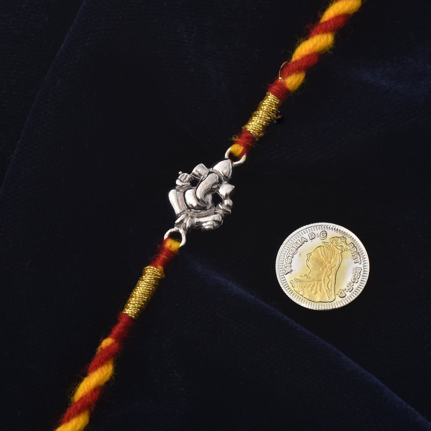 Lord Ganesha Rakhi: Threads of Blessing