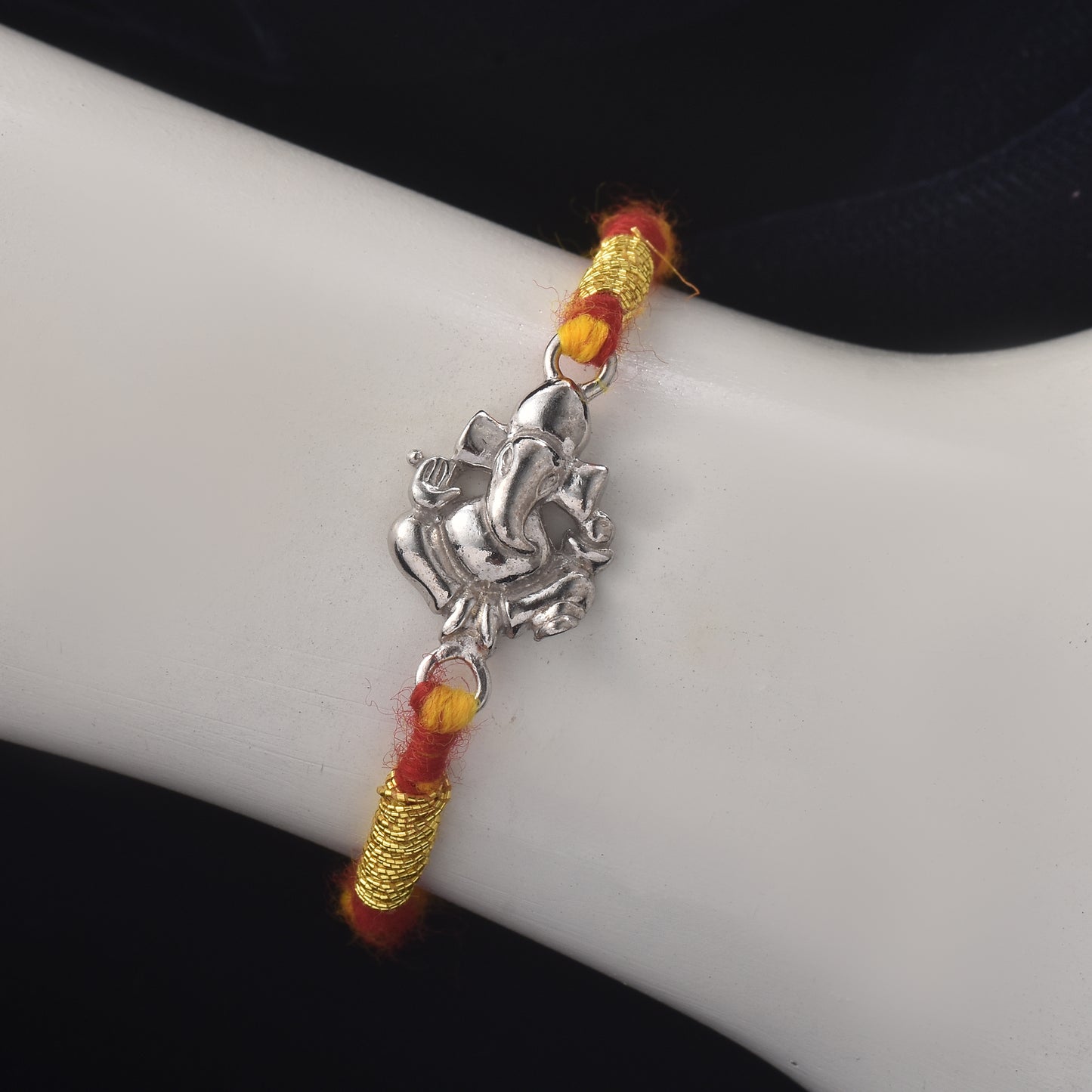Lord Ganesha Rakhi: Threads of Blessing