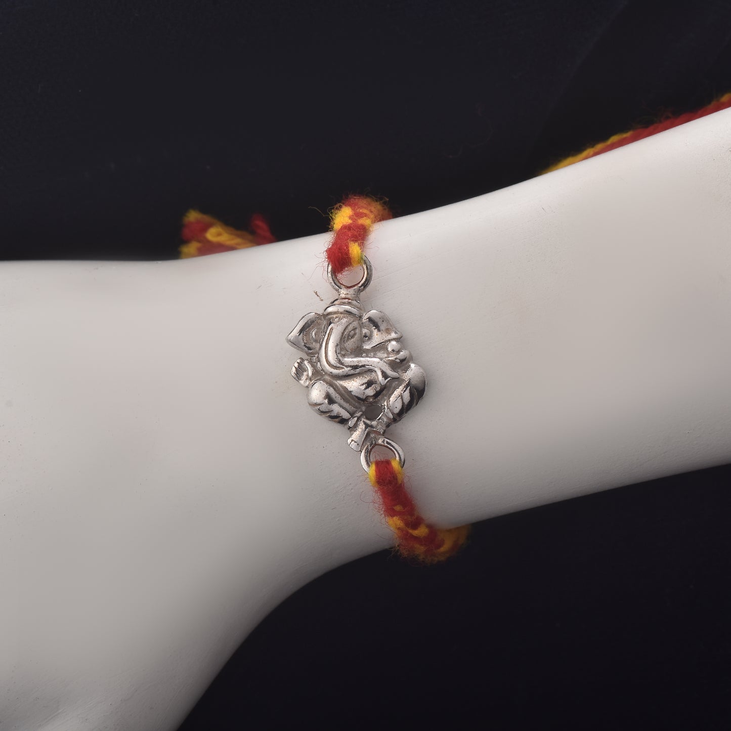 Silver Ganesha Rakhi : Leaf of Luck