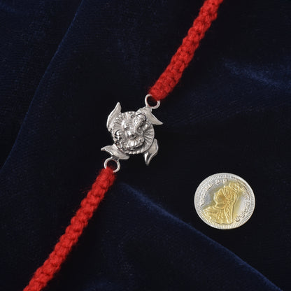 Ganpati Swastik Rakhi Charm: Spiritual Shine